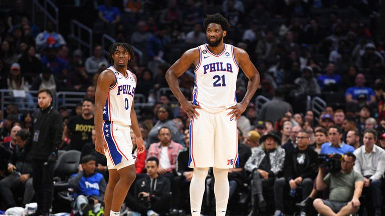 LOS ANGELES, CA - JANUARY 17: Philadelphia 76ers Center Joel Embiid (21) and Philadelphia 76ers Guard Tyrese Maxey (0) look on during a NBA game between the Philadelphia 76ers and the Los Angeles Clippers on January 17, 2023 at Crypto.com Arena in Los Angeles, CA. (Photo by Brian Rothmuller/Icon Sportswire) (Icon Sportswire via AP Images)