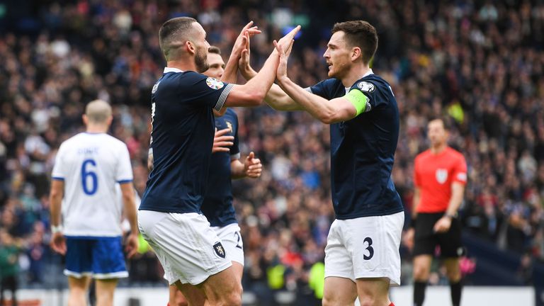 GLASGOW, SCOTLAND - MARCH 25: Scotland&#39;s John McGinn celebrates with Andy Robertson after scoring to make it 1-0 during a UEFA Euro 2024 Qualifier between Scotland and Cyprus at Hampden Park, on March 25, 2023, in Glasgow, Scotland. (Photo by Craig Foy / SNS Group)