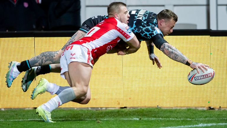 Hull KR's Mikey Lewis can't prevent Leigh's Josh Charnley from scoring the winning try