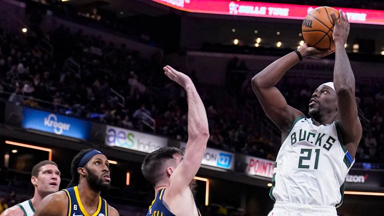 Milwaukee Bucks guard Jrue Holiday shoots over Indiana Pacers guard T.J. McConnell