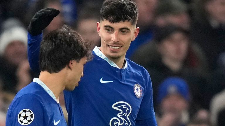 Chelsea's Kai Havertz, right, celebrates with teammate Joao Felix after scoring his sides second goal during the Champions League round of 16 second leg soccer match between Chelsea FC and Borussia Dortmund at Stamford Bridge, London, Tuesday March 7, 2023. (AP Photo/Alastair Grant)