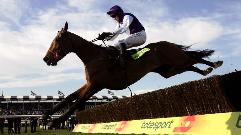 Jockey Barry Geraghty clears the last on Kicking King to go on and win the totesport Cheltenham Gold Cup Steeplechase in 2005