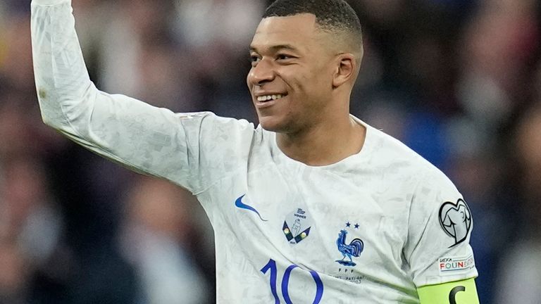 France's Kylian Mbappe celebrates after scoring his side's fourth goal during the Euro 2024 group B qualifying soccer match between France and the Netherlands at the Stade de France in Saint Denis, outside Paris, France, Friday, March 24, 2023. (AP Photo/Christophe Ena)