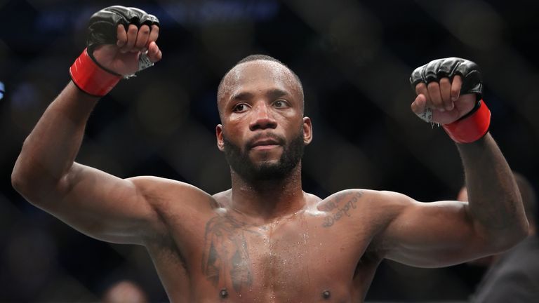 Leon Edwards celebrates victory after the welterweight title bout against Kamaru Usman during UFC 286