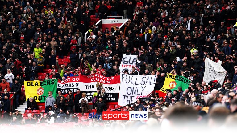 Manchester United fans with banners aimed at the club&#39;s owners are seen in the stands before the Emirates FA Cup quarter-final match at Old Trafford