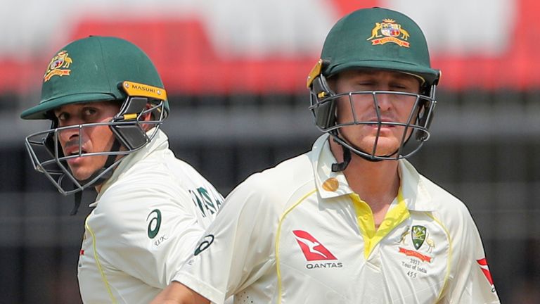 Australia&#39;s Marnus Labuschagne, right, and Usman Khawaja run between the wickets to score during the first day of third cricket test match between India and Australia in Indore, India, Wednesday, March 1, 2023. (AP Photo/Surjeet Yadav)