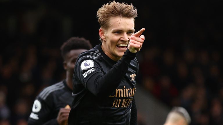 Martin Odegaard celebrates scoring Arsenal's third goal