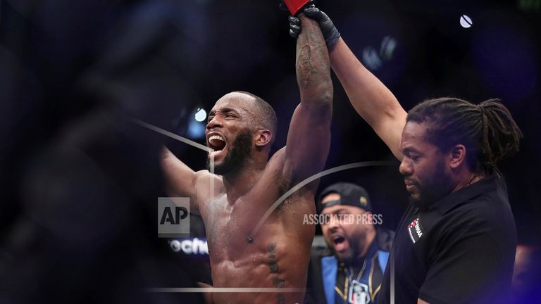 Leon Edwards celebrates his victory over Kamaru Usman in the the welterweight title bout at the UFC 286.