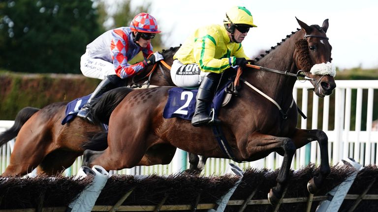 Molliana and Robbie Dunne (right) in action during the Sky Sports Racing Mares&#39; Handicap Hurdle during the ELY Memorial Fund Charity Raceday at Hereford Racecourse