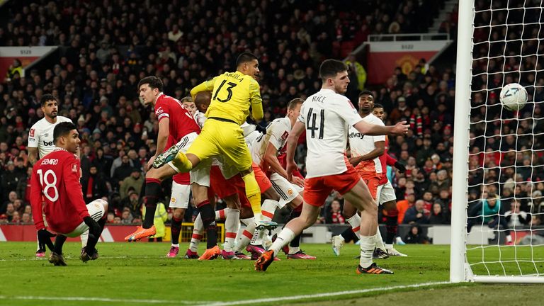 Players look on as West Ham&#39;s Nayef Aguerd heads into his own goal