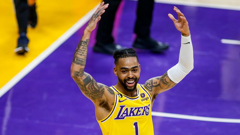Los Angeles Lakers guard D'Angelo Russell (1) celebrates after scoring against the Phoenix Suns.