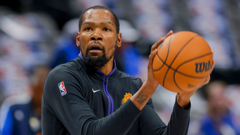 Phoenix Suns forward Kevin Durant injures ankle in pre-game slip.