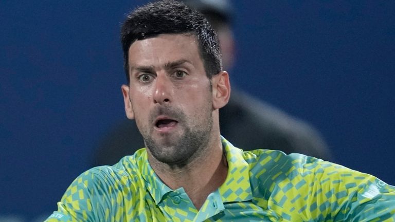 Serbia&#39;s Novak Djokovic returns the ball to Poland&#39;s Hubert Hurkacz during their quarter final match of the Dubai Duty Free Tennis Championships in Dubai, United Arab Emirates, Thursday, March 1, 2023. (AP Photo/Kamran Jebreili) 