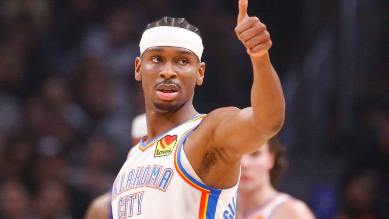 Oklahoma City Thunder guard Shai Gilgeous-Alexander (2) gives a thumbs up during the first half of an NBA basketball game against the Los Angeles Clippers Tuesday, March 21, 2023, in Los Angeles. (AP Photo/Ringo H.W. Chiu)