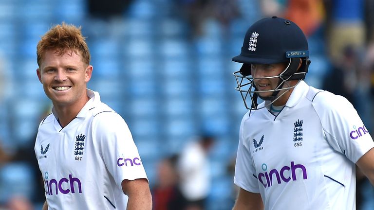 England&#39;s Ollie Pope, left, and England&#39;s Joe Root leave the field at the end of play on the fourth day of the third cricket test match between England and New Zealand at Headingley in Leeds, England, Sunday, June 26, 2022.. (AP Photo/Rui Vieira)