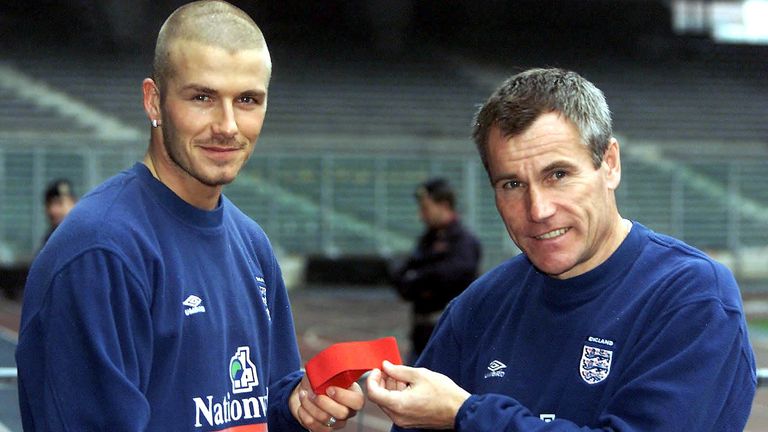 Peter Taylor hands David Beckham the England captaincy for the first time.