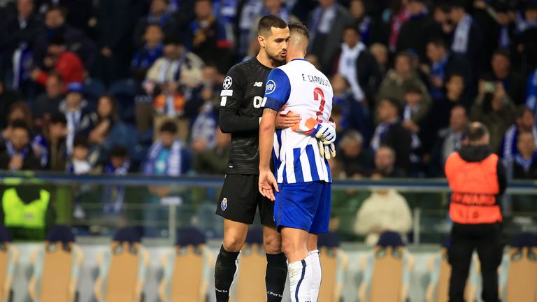 Porto&#39;s goalkeeper Diogo Costa embraces team-mate Fabio Cardoso