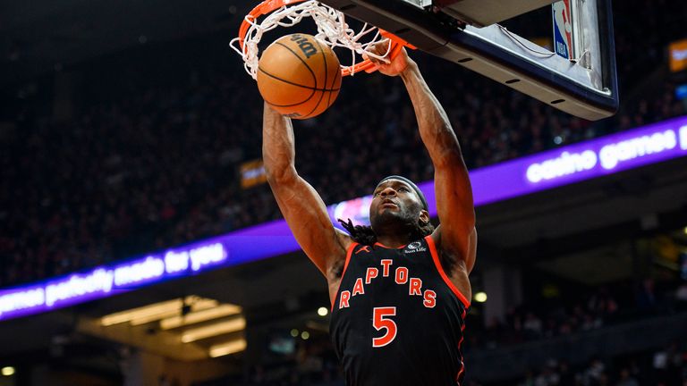 Toronto Raptors forward Precious Achiuwa dunks against the Miami Heat.