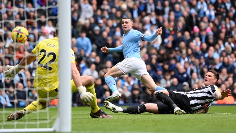 Phil Foden shoots past Nick Pope to give Man City the lead against Newcastle