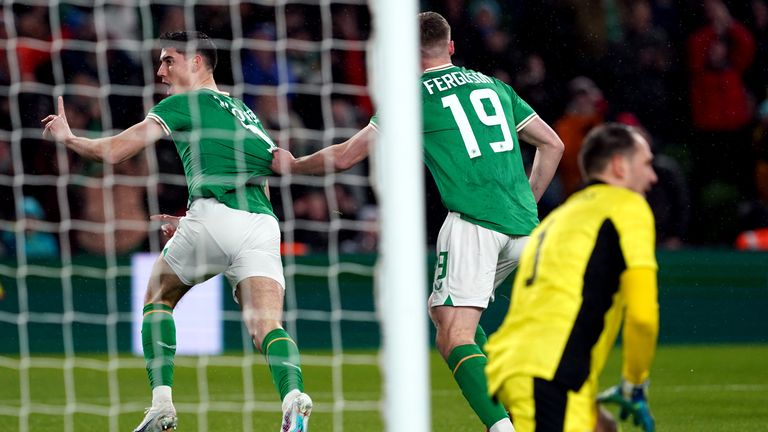 Republic of Ireland's Callum O'Dowda (left) celebrates scoring the opening goal against Latvia