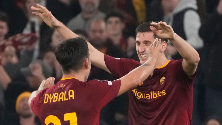 Roma's Marash Kumbulla, right, celebrates with Roma's Paulo Dybala after scoring his side's 2nd goal during the Europa League soccer match between Roma and Real Sociedad at Rome's Olympic stadium, Thursday, March 9, 2023. (AP Photo/Gregorio Borgia)