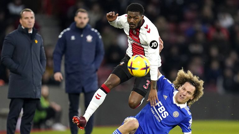 Ainsley Maitland-Niles evades a challenge from Wout Faes