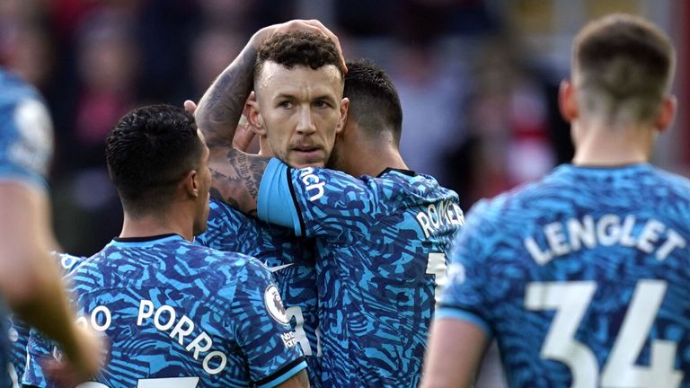 Ivan Perisic is congratulated by team-mates after scoring Spurs' third goal at Southampton