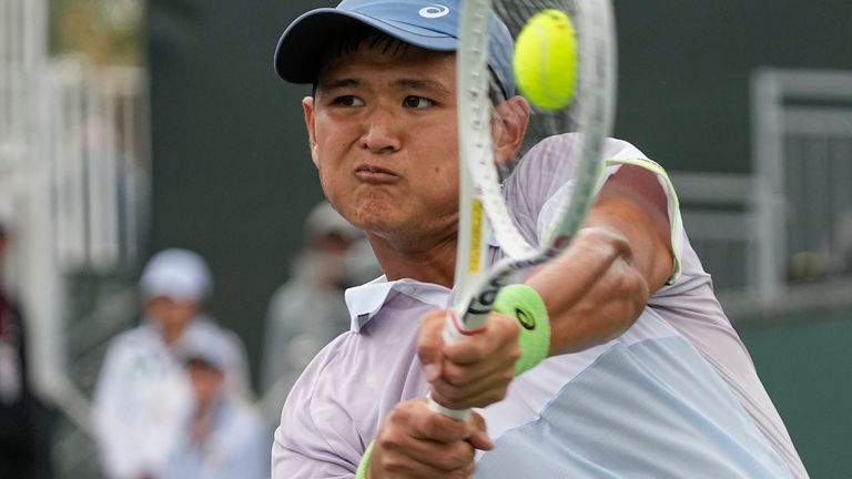 Tung-Lin Wu, of Taiwan, returns a shot to Cameron Norrie, of Britain, at the BNP Paribas Open tennis tournament Friday, March 10, 2023, in Indian Wells, Calif. (AP Photo/Mark J. Terrill)
