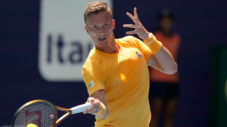 Jiri Lehecka of the Czech Republic returns to Lorenzo Musetti of Italy during the Miami Open tennis tournament, Saturday, March 25, 2023, in Miami Gardens, Fla. (AP Photo/Marta Lavandier)