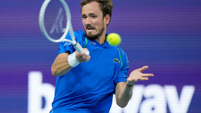 Daniil Medvedev, of Russia, returns a shot from Roberto Carballes Baena, of Spain, during the Miami Open tennis tournament, Saturday, March 25, 2023, in Miami Gardens, Fla. (AP Photo/Wilfredo Lee)