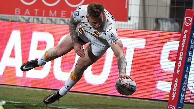 Picture by Olly Hassell/SWpix.com - 03/03/2023 - Rugby League - Betfred Super League Round 3 - Catalans Dragons v Hull FC - Stade Gilbert Brutus, Perpignan, France - Catalans Tom Johnstone scores a try