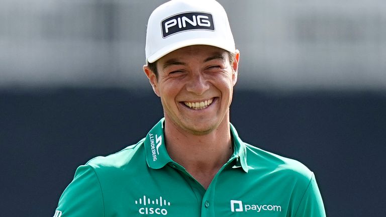 Viktor Hovland, of Norway, smiles as he walks off the 17th green after parring the hole during the second round of the Players Championship golf tournament Friday, March 10, 2023, in Ponte Vedra Beach, Fla. (AP Photo/Eric Gay)