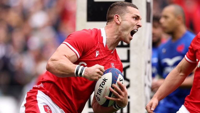 George North celebrates after scoring Wales' opening try against France