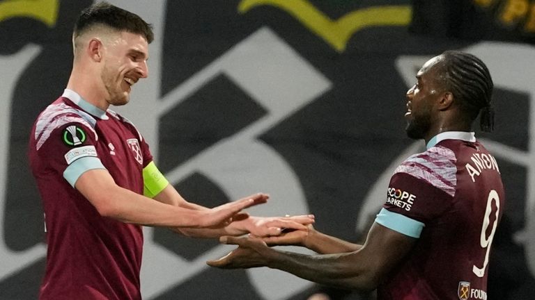 West Ham's Michail Antonio, right, celebrates with teammates after scoring the opening goal of his team during the Europa Conference League round of 16 first leg soccer match between AEK Larnaca FC and West Ham United FC at AEK arena stadium in Larnaca, Cyprus, Thursday, March 9, 2023. (AP Photo/Petros Karadjias)