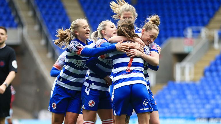 Reading players mob Charlie Wellings after her opening goal against West Ham