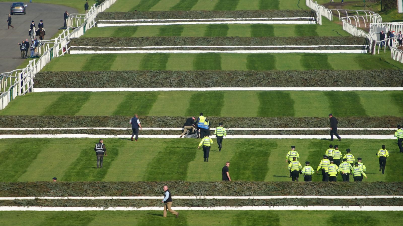Grand National Race under way following delay due to protest LIVE