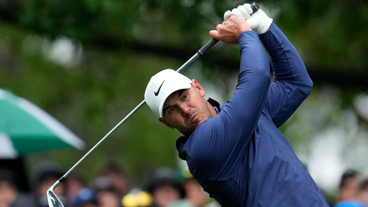 Brooks Koepka watches his tee shot on the fourth hole during the weather delayed third round of the Masters golf tournament at Augusta National Golf Club on Saturday, April 8, 2023, in Augusta, Ga. (AP Photo/Mark Baker)