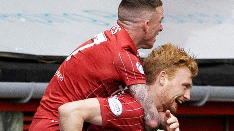 ABERDEEN, SCOTLAND - APRIL 23: Liam Scales celebrates making it 1-0 Aberdeen during a cinch Premiership match between Aberdeen and Rangers at Pittodrie, on April 22, 2023, in Aberdeen, Scotland. (Photo by Alan Harvey / SNS Group)