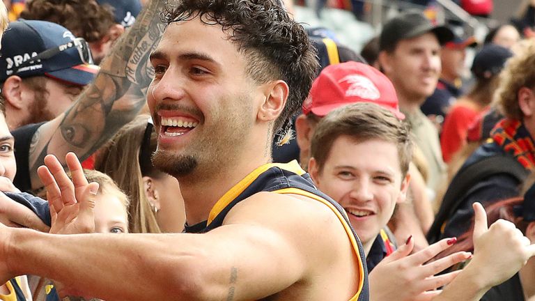 ADELAIDE - APRIL 08: Izak Rankine of the Crows with fans after the win during the 2023 AFL Round 04 match between the Adelaide Crows and the Fremantle Dockers at Adelaide Oval on April 8, 2023 in Adelaide, Australia. (Photo by Sarah Reed/AFL Photos)