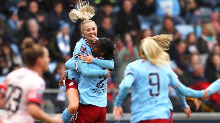 Alex Greenwood celebrates with Bunny Shaw after combining to fire City 2-1 ahead