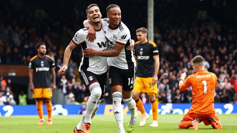 Andreas Pereira celebrates with team-mate Bobby Reid after Fulham take a 2-0 lead
