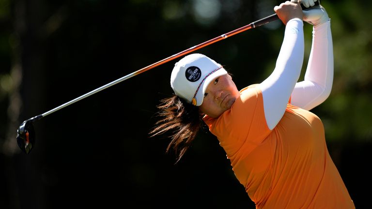 Angel Yin watches her tee shot on the 15th hole during the third round of the Chevron Championship women's golf tournament at The Club at Carlton Woods on Saturday, April 22, 2023, in The Woodlands, Texas. (AP Photo/David J. Phillip)