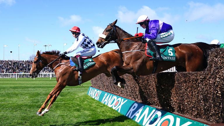 Banbridge (left) jumps on the way to Aintree victory