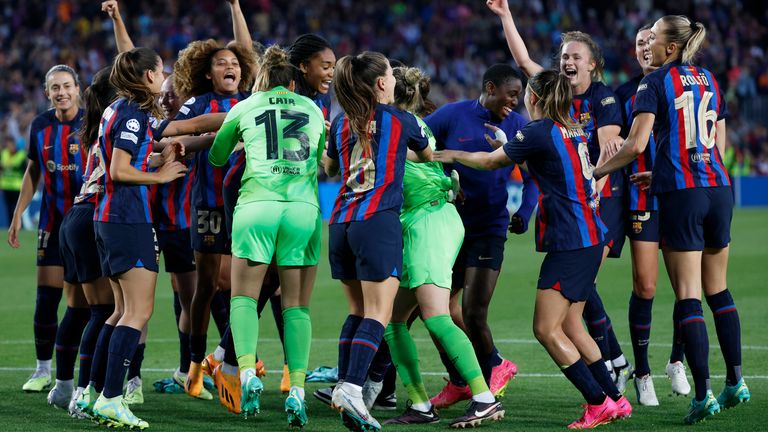 Barcelona players celebrate after reaching the final of the UEFA Women's Champions League following a 2-1 aggregate win over Chelsea