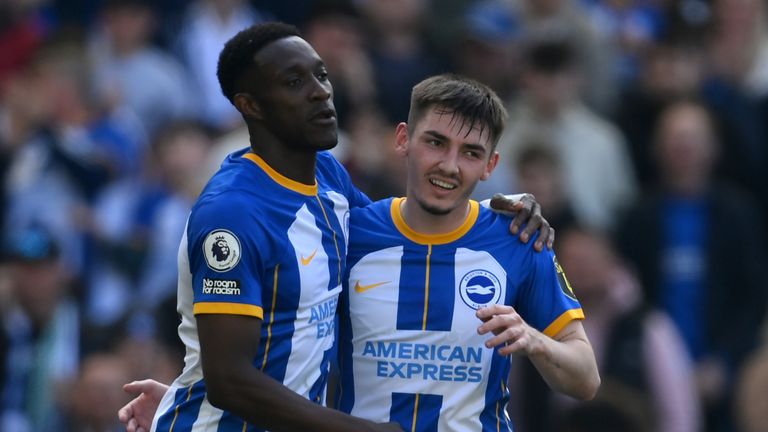 Danny Welbeck is congratulated by team-mate Billy Gilmour after scoring Brighton's fourth goal against Wolves