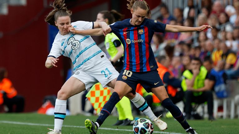 Chelsea's Niamh Charles challenges Barcelona's Caroline Graham Hansen