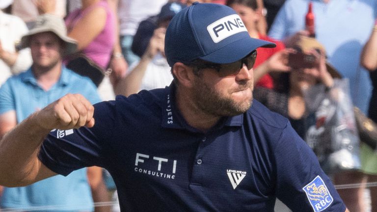 Corey Conners celebrates his victory in the Valero Texas Open golf tournament in San Antonio with a score of 15 under par, Sunday, April 2, 2023. (AP Photo/Michael Thomas)