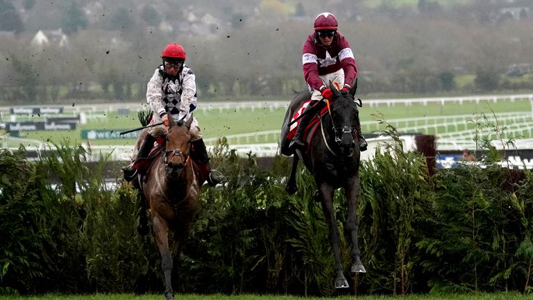 Delta Work and Galvin jump the last in the Cross Country Chase at Cheltenham