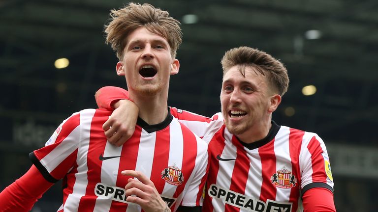 Dennis Cirkin (left) celebrates with Sunderland's team-mate Dan Neil after heading them level