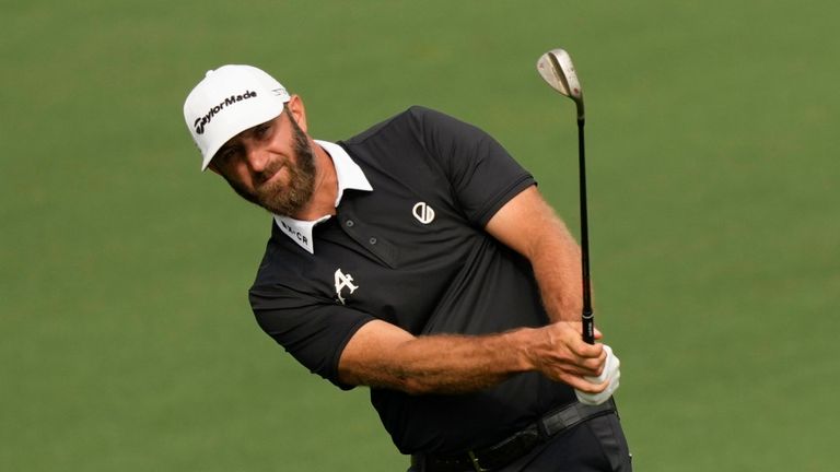 Dustin Johnson chips to the green on the second hole during the second round of the Masters golf tournament at Augusta National Golf Club on Friday, April 7, 2023, in Augusta, Ga. (AP Photo/David J. Phillip)